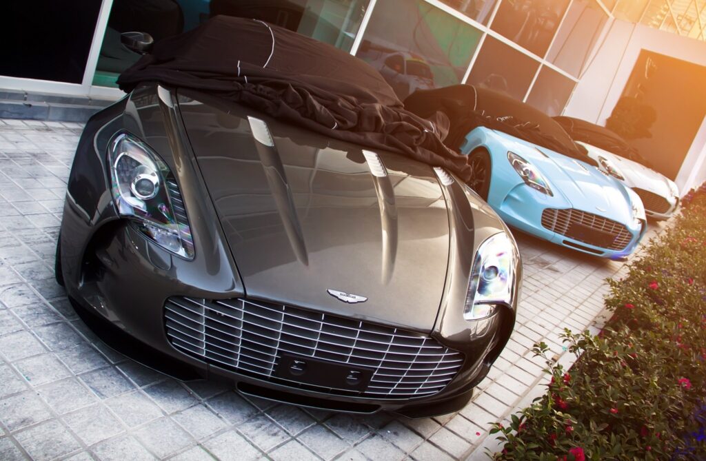 Aston Martin Wallpaper: Luxury Cars Showcase Sleek Design & Performance