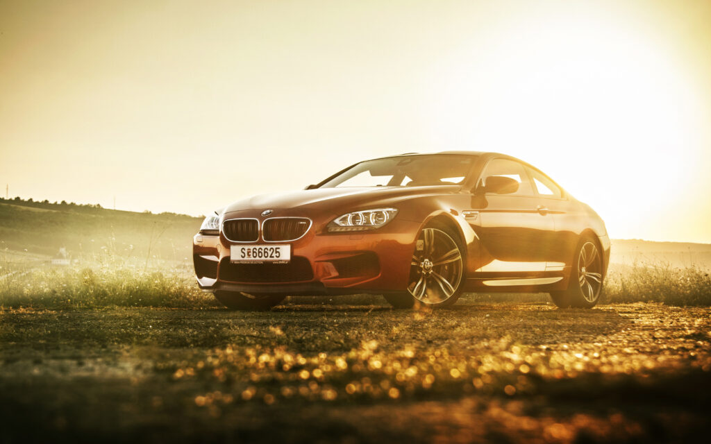 Stunning BMW M6 Wallpaper: Luxury in Golden Sunset Light