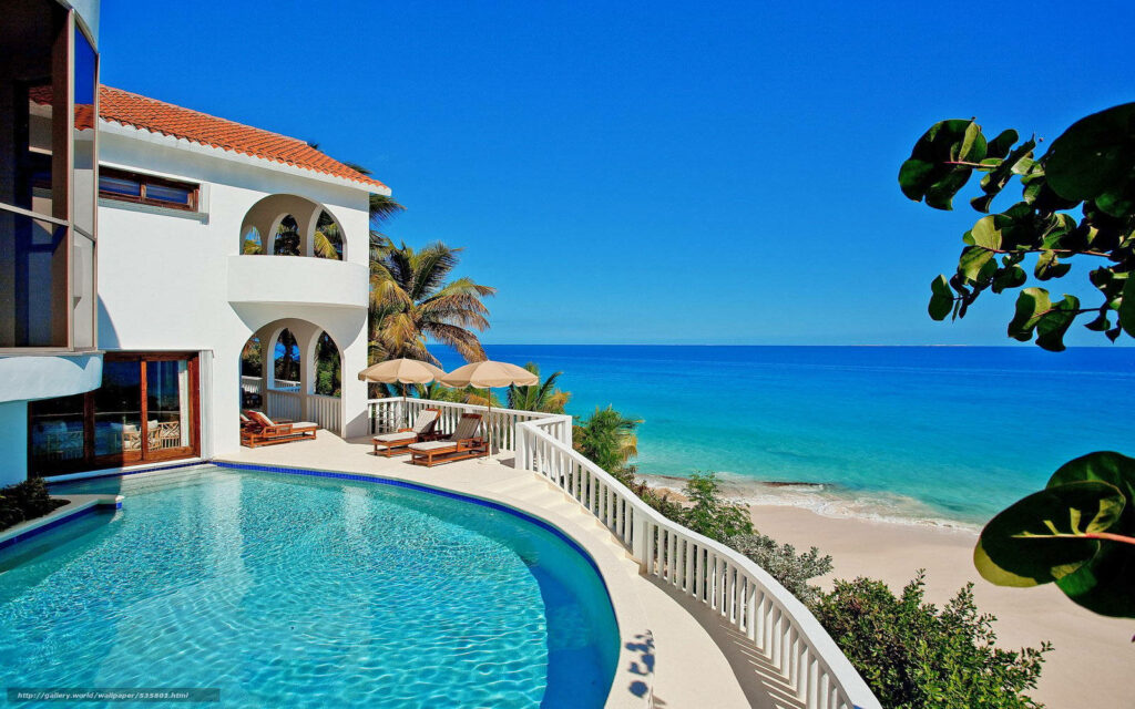 Luxurious Beach House with Infinity Pool & Ocean Views - Coastal Escape Wallpaper