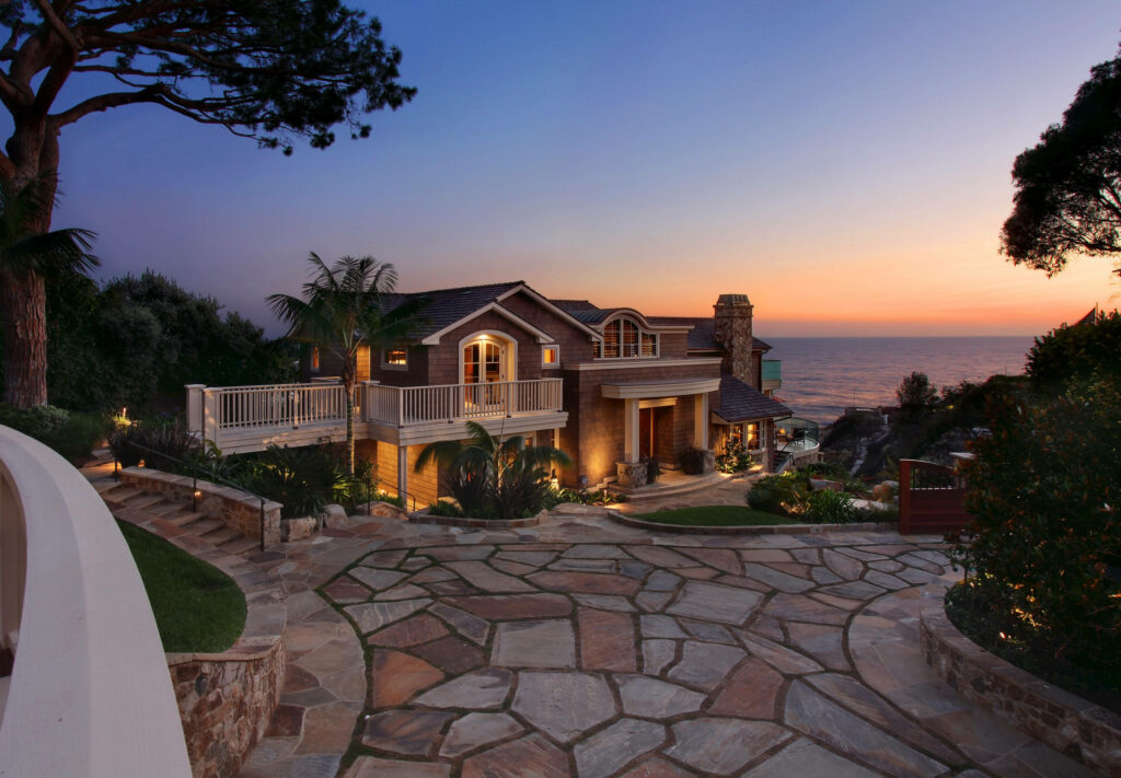 Luxurious Beach House Wallpaper: Sunset, Ocean Views & Elegant Design