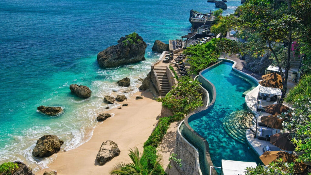Luxurious Beach Resort Wallpaper: Infinity Pool & Tropical Paradise