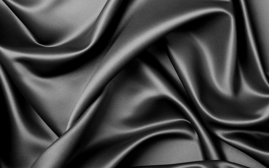 Elegant Black Silk Wallpaper – Luxurious Textured Background