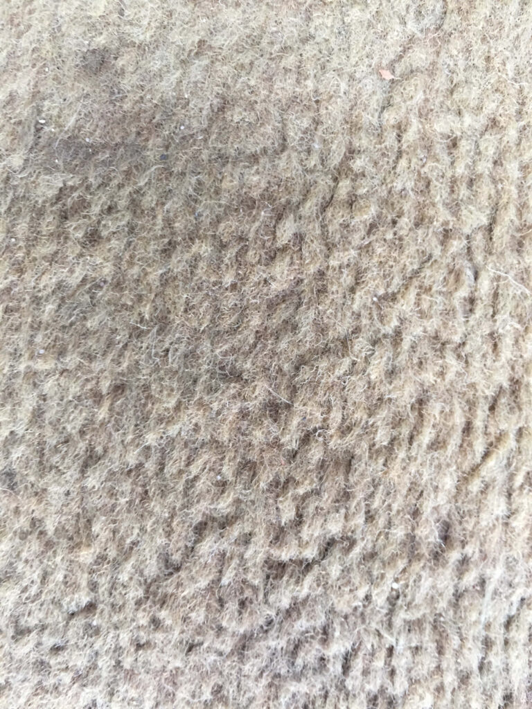 Luxurious Brown Carpet Close-Up: Unique Textured Pattern & Plush Feel Wallpaper