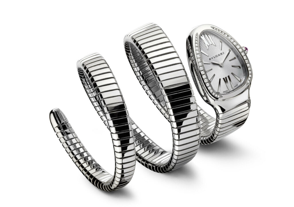 Luxurious Bvlgari Serpenti watch in silver with sleek reflective finish and minimalist dial wallpaper