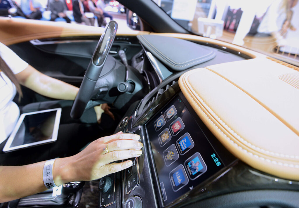 Luxurious Car Interior: Advanced Touchscreen Technology Wallpaper