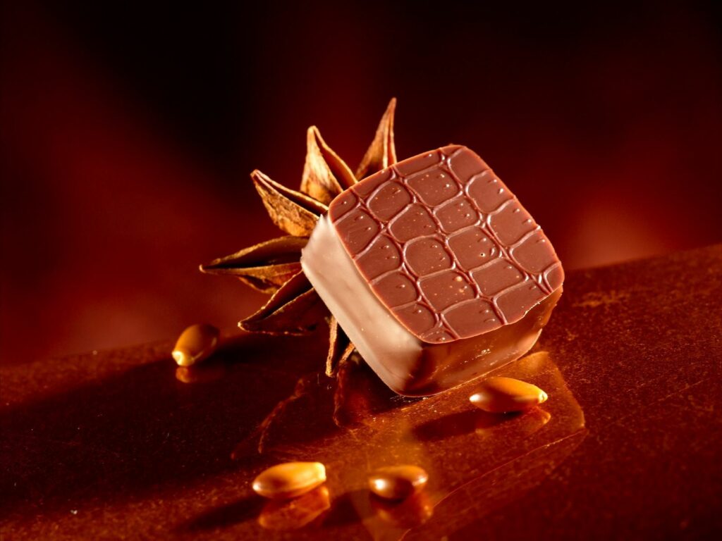 Luxurious Chocolate Wallpaper with Nuts & Star Anise Background