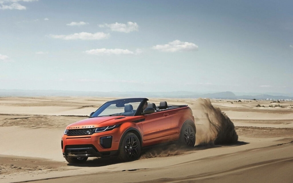 Stunning Desert Adventure Wallpaper: Luxurious Land Rover Escape