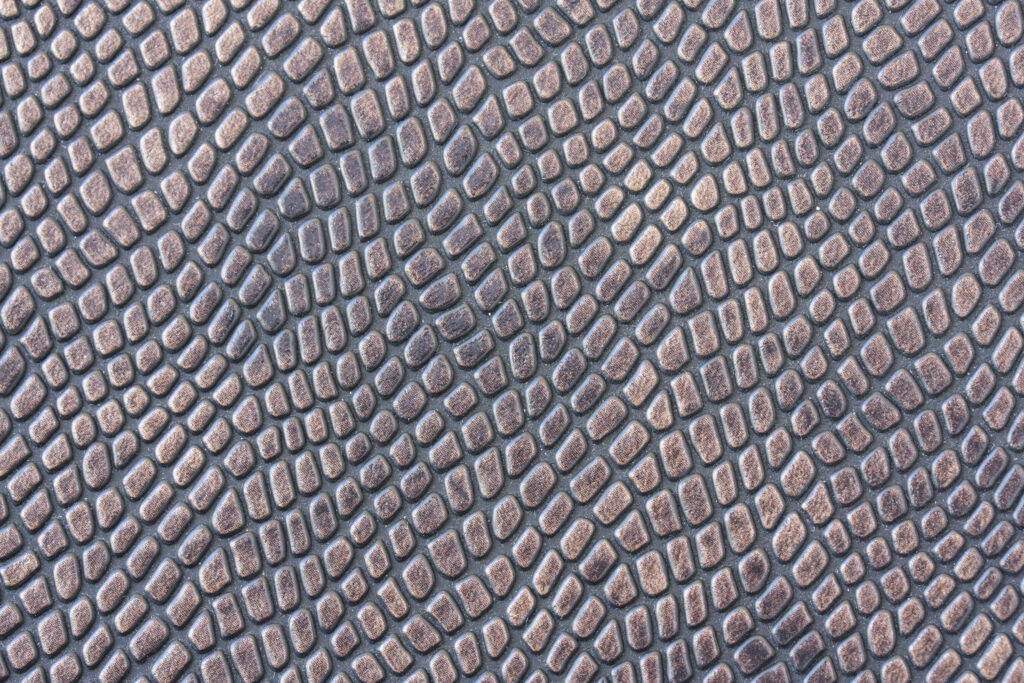 Elegant Crocodile Skin Wallpaper: Textured Luxury Background Design