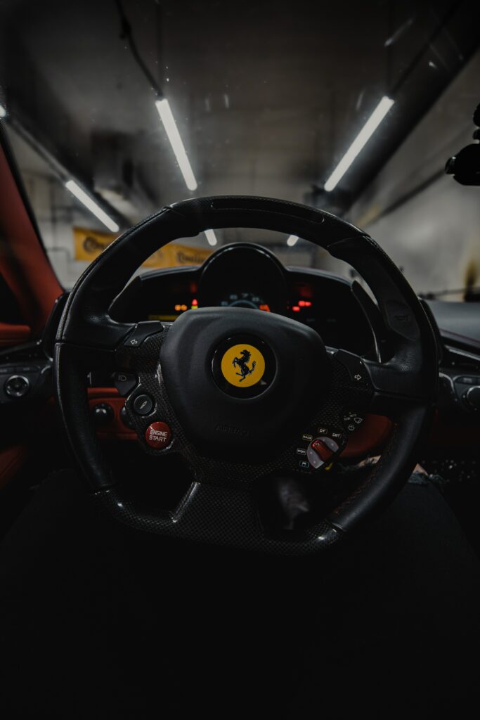 Luxurious Ferrari Dashboard Wallpaper: Thrill & Elegance Captured