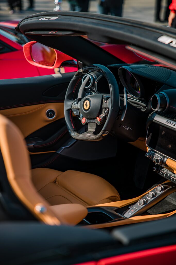 Luxurious Ferrari Interior: Sleek Design & Opulent Craftsmanship Wallpaper