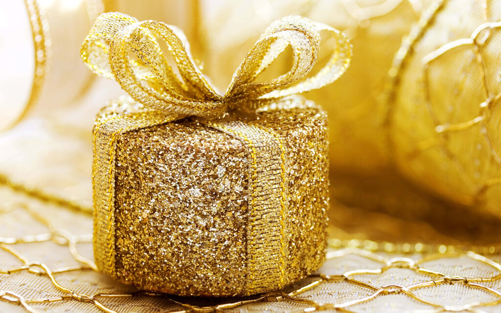 Elegant Gold Gift Box Wallpaper with Shimmering Ribbon & Sparkling Background