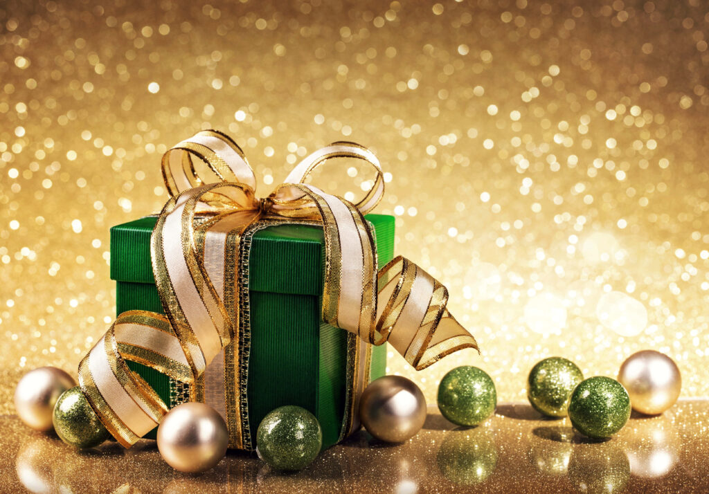 Luxurious Holiday Wallpaper: Green Gift Box & Golden Ornaments