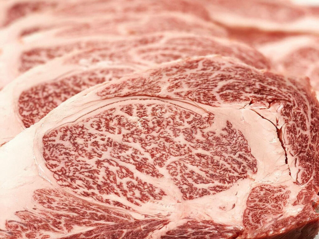 Luxurious Untrimmed Kobe Beef Close-Up: Marbled Texture Wallpaper