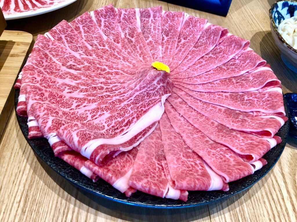 Luxurious Kobe Beef Presentation: Stunning Marbling Wallpaper