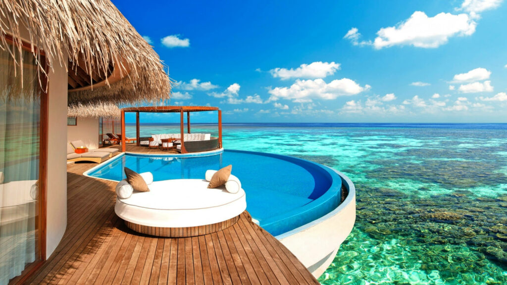 Luxurious Maldives Hotel Suite with Infinity Pool & Coral Reef Views Wallpaper