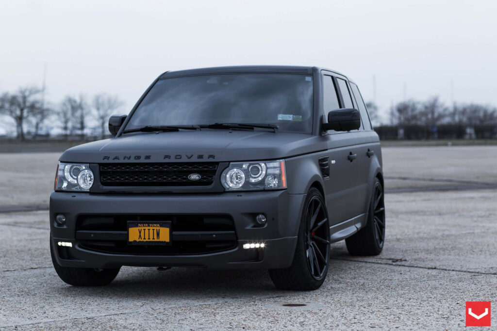 Luxurious Matte Black Range Rover: Sleek Wallpaper Background