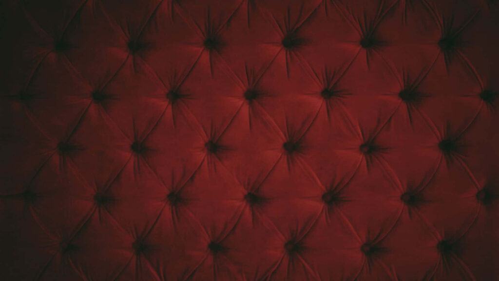 Luxurious Red Tufted Wallpaper Background with Elegant Textures