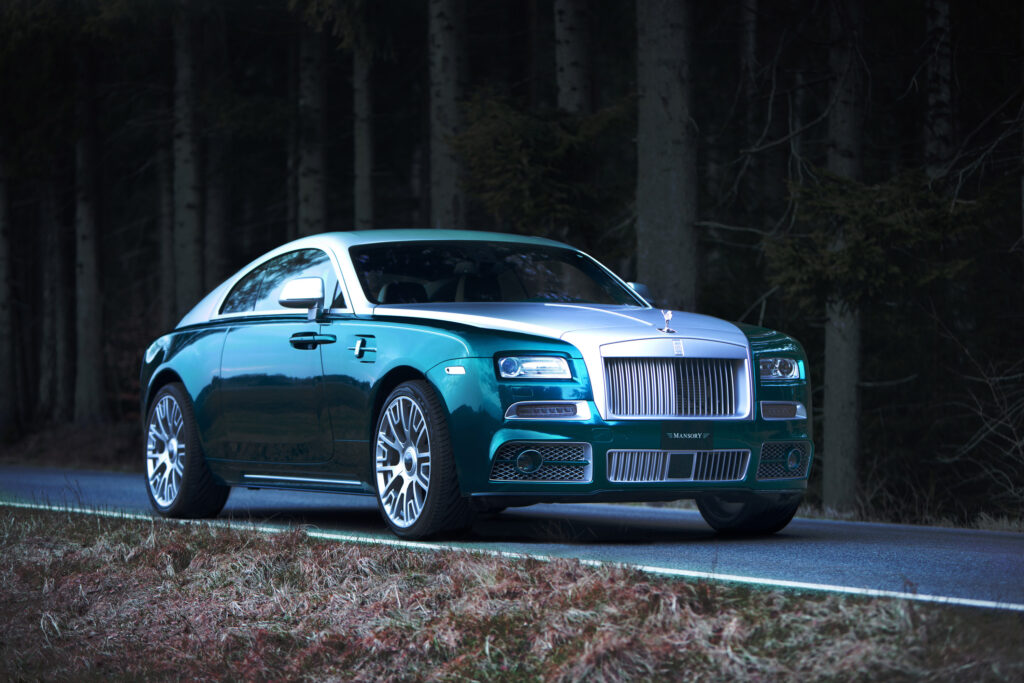 Luxurious Rolls-Royce Wraith Coupe with Mansory Kit in Forest Setting Wallpaper