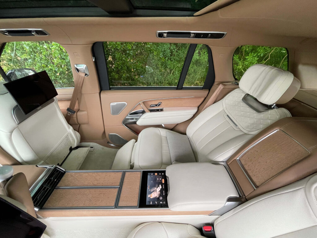 Luxurious SUV Interior Wallpaper: Plush Leather & Modern Design