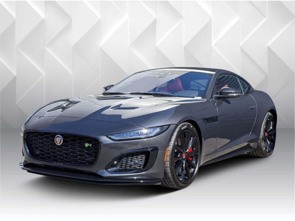 Sleek Luxury Sports Car in Modern Showroom | Elegant Wallpaper Background