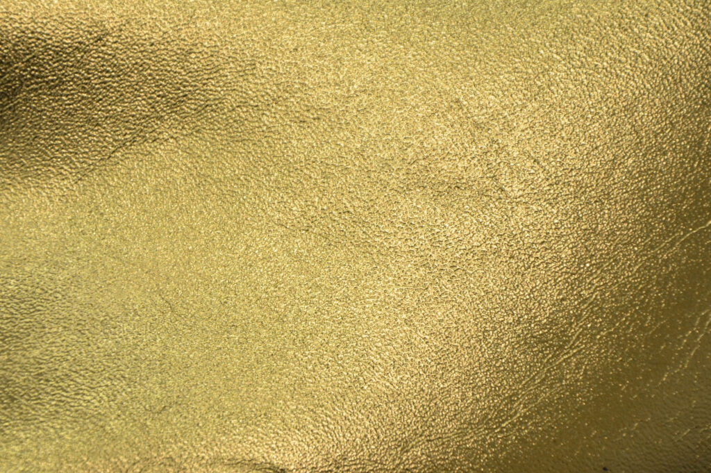 Elegant Textured Gold Leather Wallpaper - Luxurious Background Design