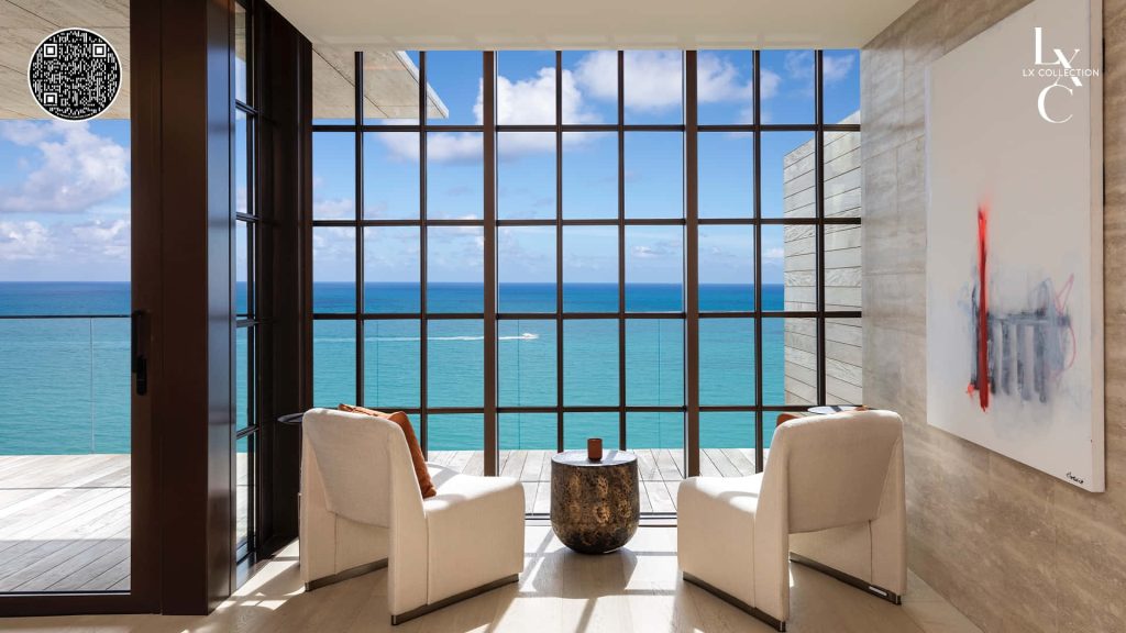 Luxurious virtual office background with cream armchairs and ocean view for professional Zoom calls Wallpaper
