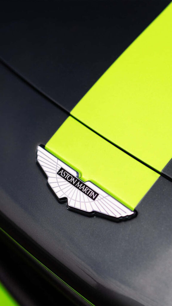 Luxury Aston Martin Close-Up: Sleek Design & Iconic Logo Wallpaper