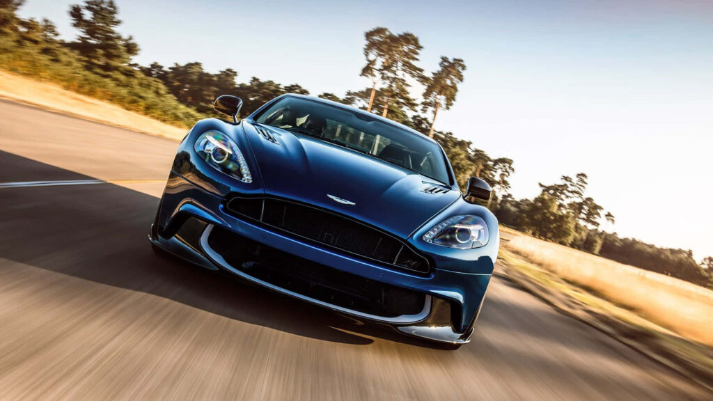 Stunning Aston Martin Vanquish Wallpaper: Luxury Grand Tourer in Blue