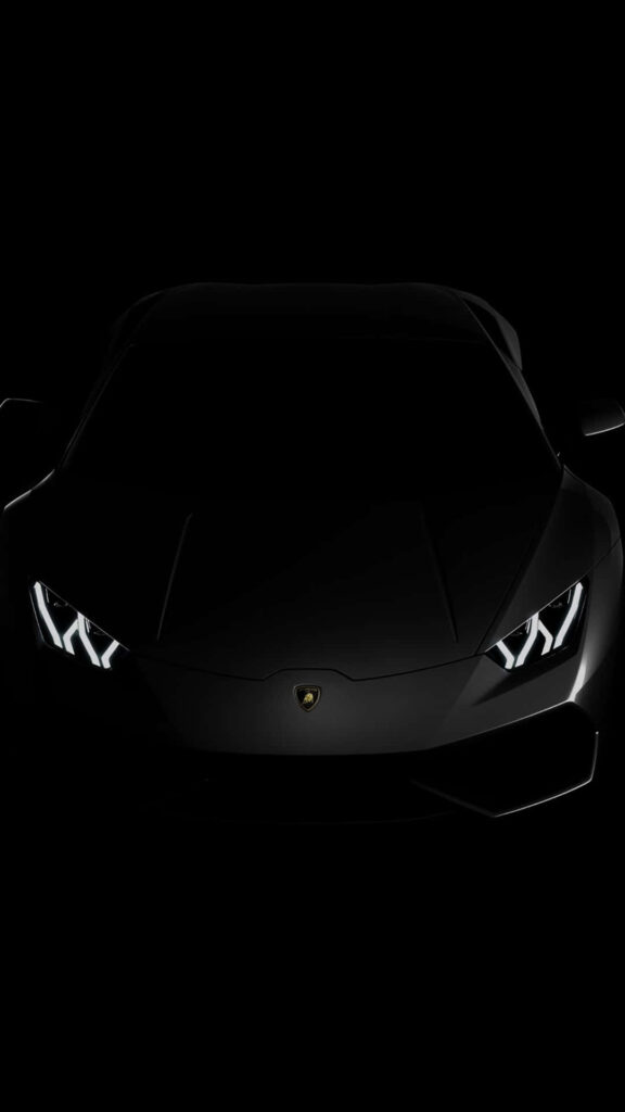 Black Lamborghini front view with LED headlights luxury car phone wallpaper background dark