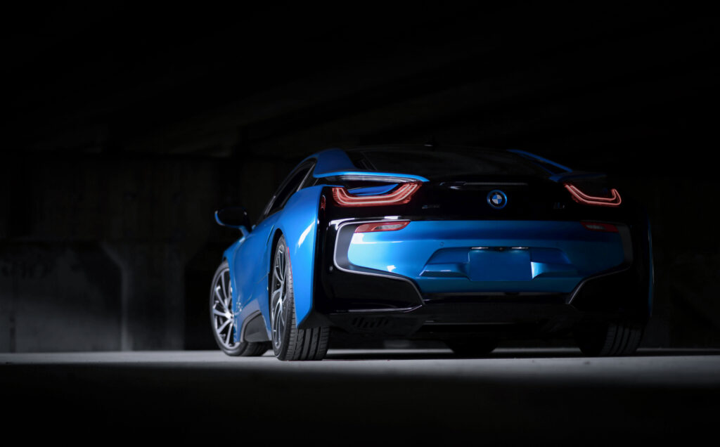 Sleek Blue BMW i8 Rear View Wallpaper: Luxury Sportscar Design