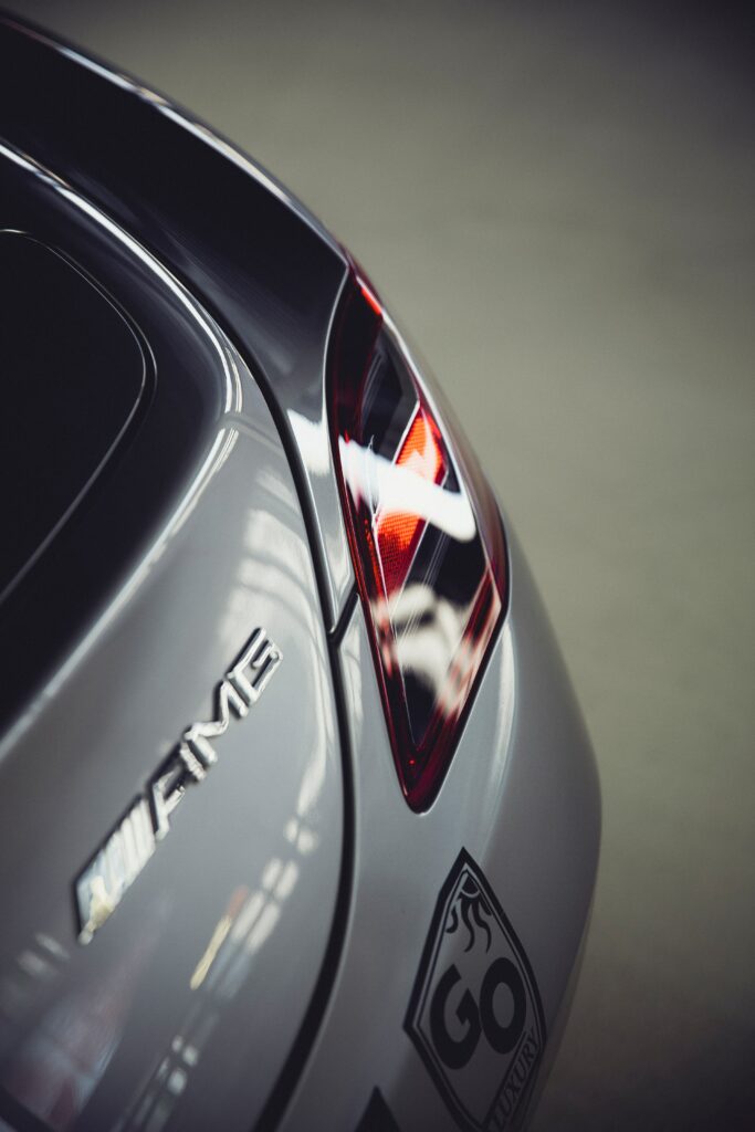 Stunning High-Res Luxury Car Wallpaper: Sleek Rear Optics & Design
