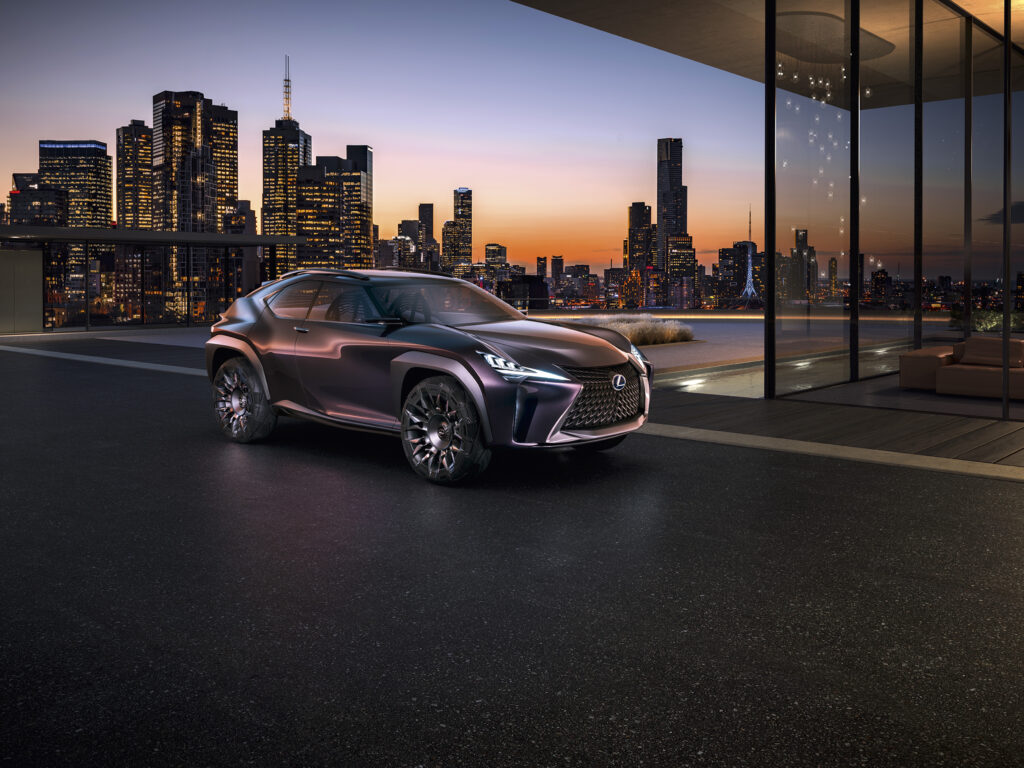 Sleek Lexus Against Sunset Skyline - Modern Luxury Wallpaper