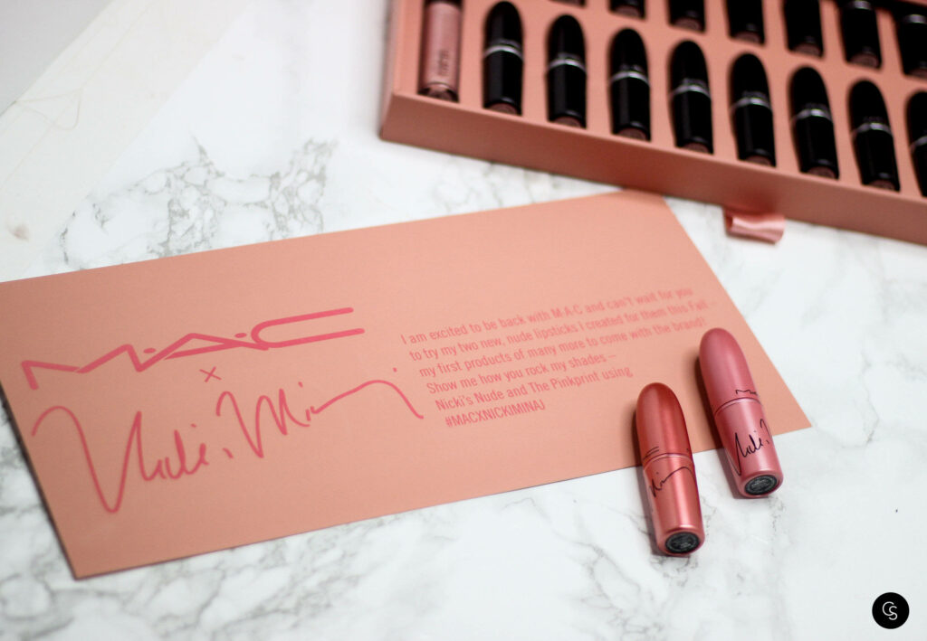 MAC x Nicki Minaj lipstick collection on marble background with soft pink hues and elegant packaging Wallpaper