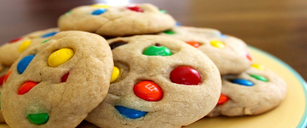 Delectable Delights: Irresistible M&M's Cookies in 3440x1440p Glory Wallpaper