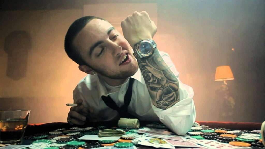 Inked Inspiration: Mac Miller Channels his Inner Artist in Stunning HD Photo Wallpaper