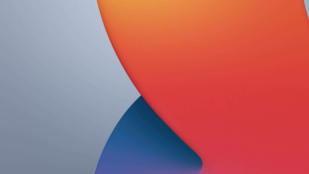 Vibrant macOS Big Sur wallpaper with abstract blue grey curves and warm orange-red gradient background