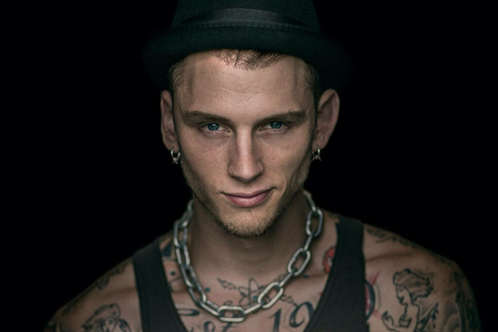 Machine Gun Kelly Portrait Wallpaper: Tattoos & Confident Style