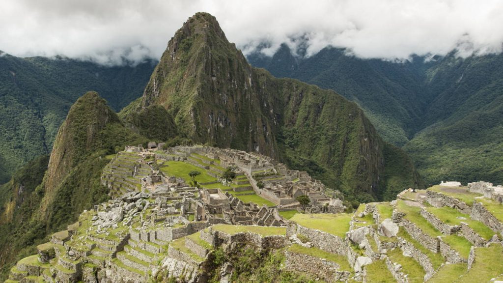 Machu Picchu Peru ancient stone ruins green terraces Huayna Picchu mountain Andes landscape wallpaper