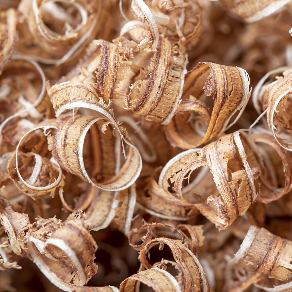Intricate Macro Wallpaper of Curly Wood Shavings in Natural Tones