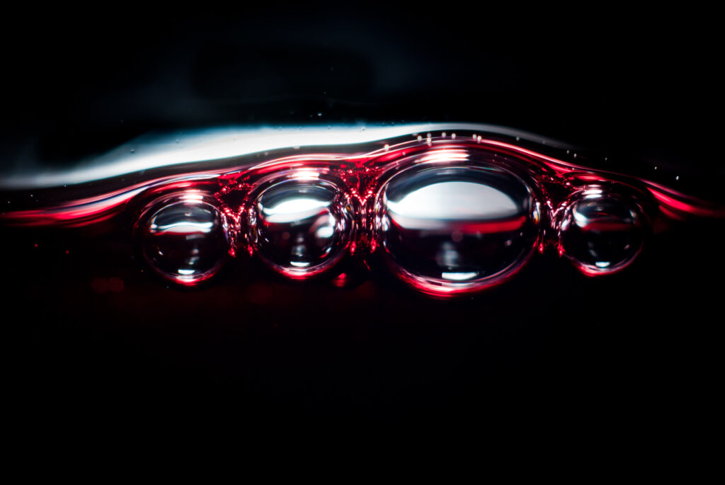 Vibrant Bubble Macro in Dark Liquid - Stunning Wallpaper Background