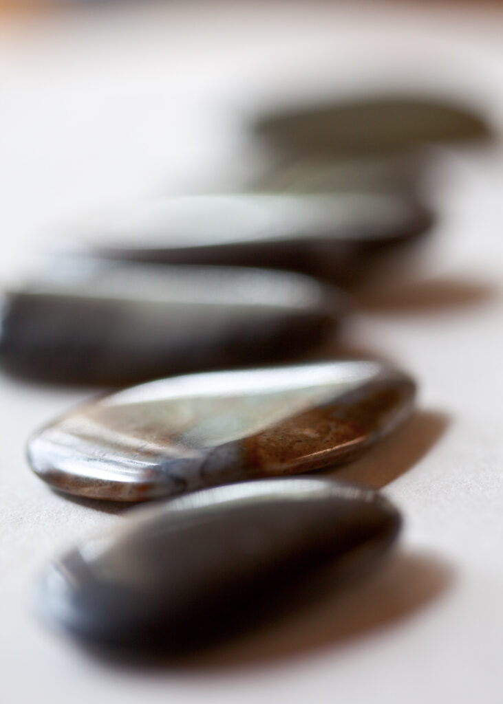 Macro Texture of Smooth Pebbles: Blurred Background Wallpaper