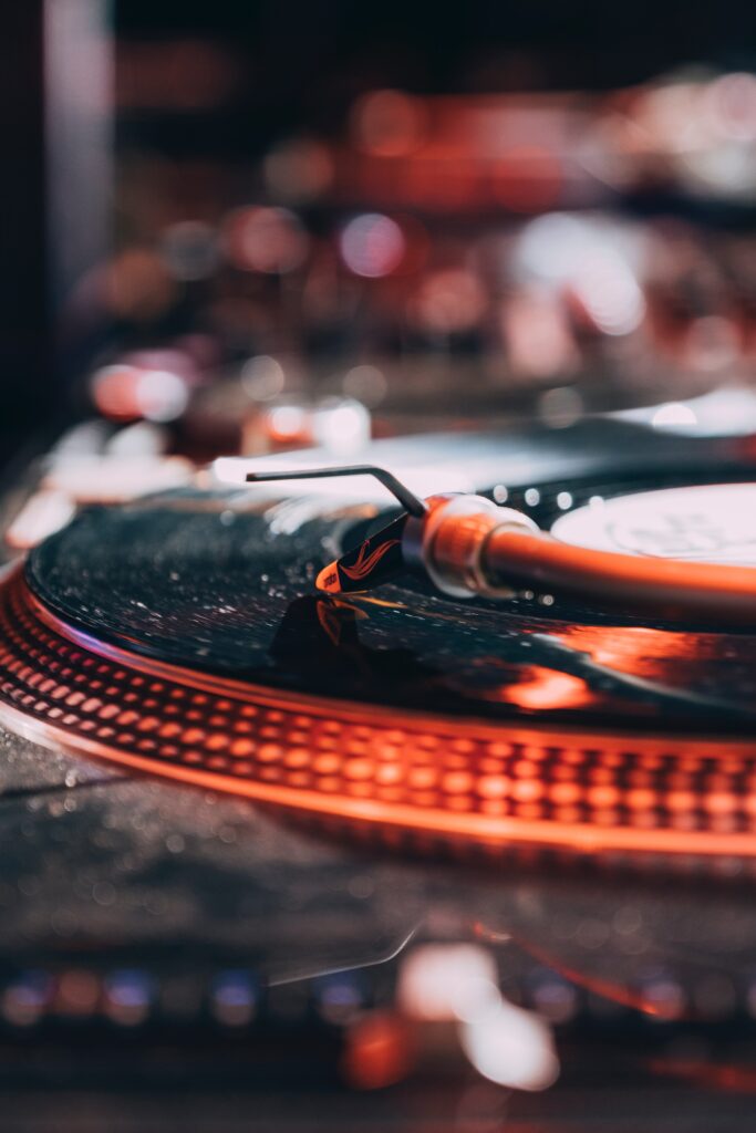 Macro Vinyl Record Player Wallpaper: Detailed Shot with Dramatic Lighting