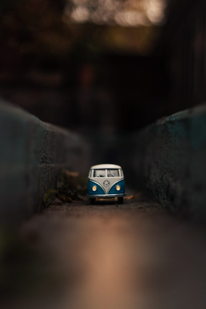 Macro Shot of Toy Volkswagen Bus: Nostalgic Wallpaper Background