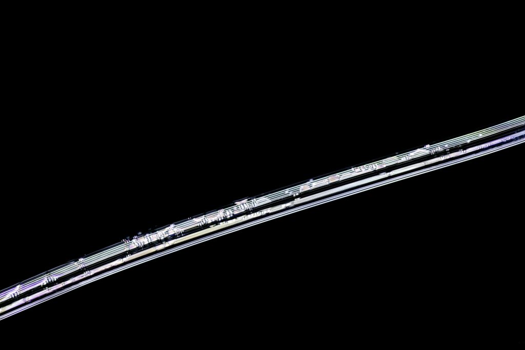 Macro Transparent Straw Wallpaper on Sleek Black Background
