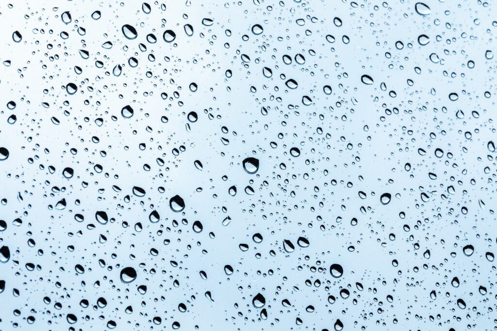 Macro Water Droplets on Glass - Intricate Patterns Wallpaper
