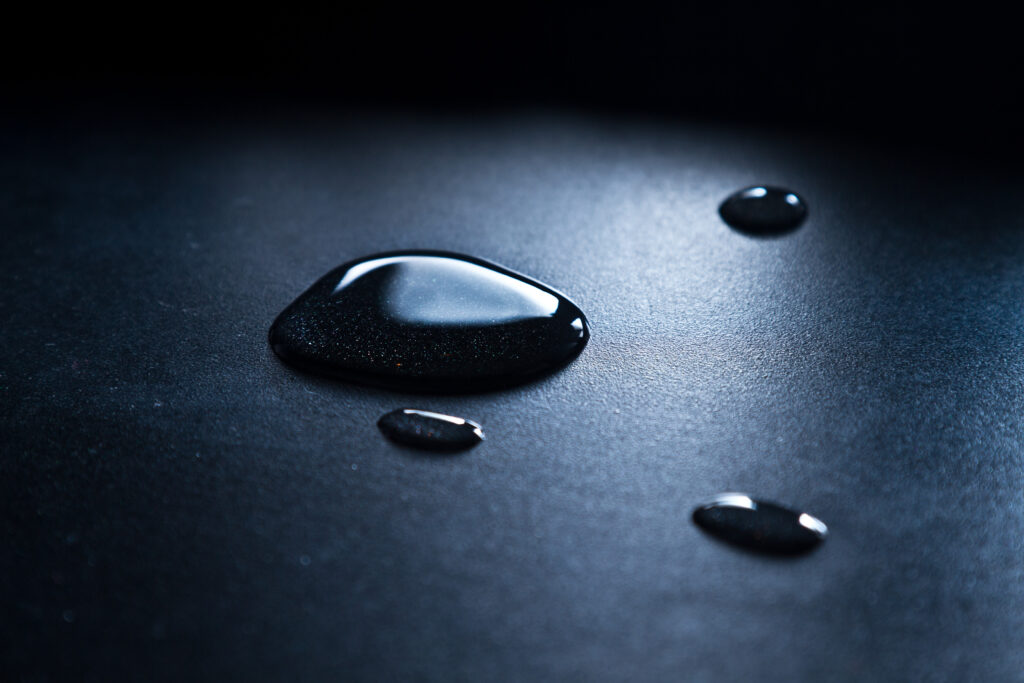 Macro Water Drops on Dark Surface - Smooth Texture Wallpaper