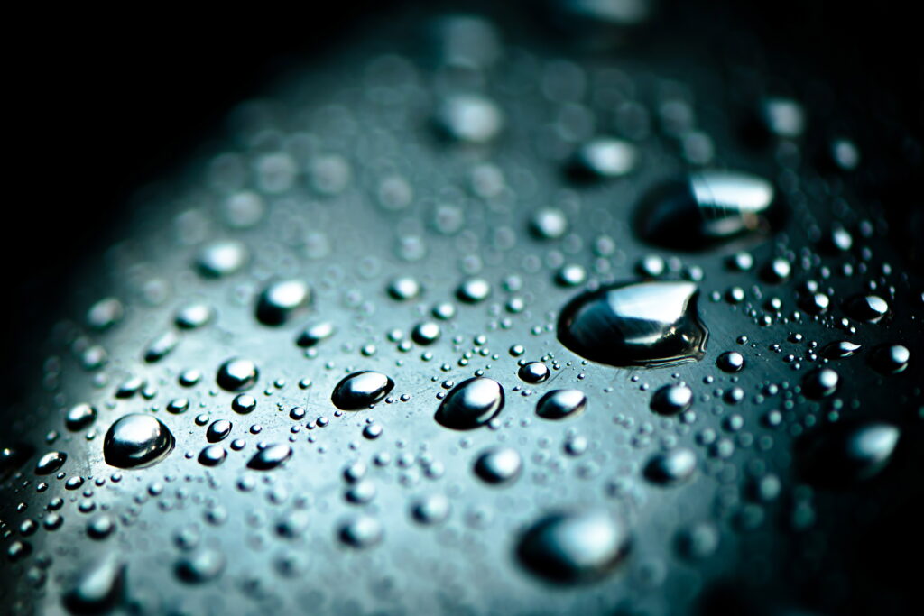 Macro Water Drops on Smooth Surface | Dramatic Depth of Field Wallpaper