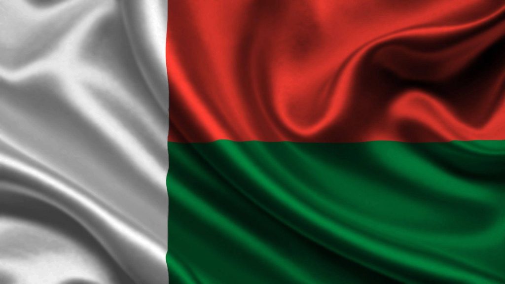 High-resolution Madagascar flag wallpaper with silky texture and dramatic lighting folds