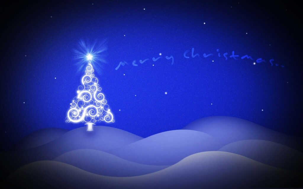 Enchanting Winter Wonderland: Illuminated Christmas Tree on Snowy Mountain Wallpaper