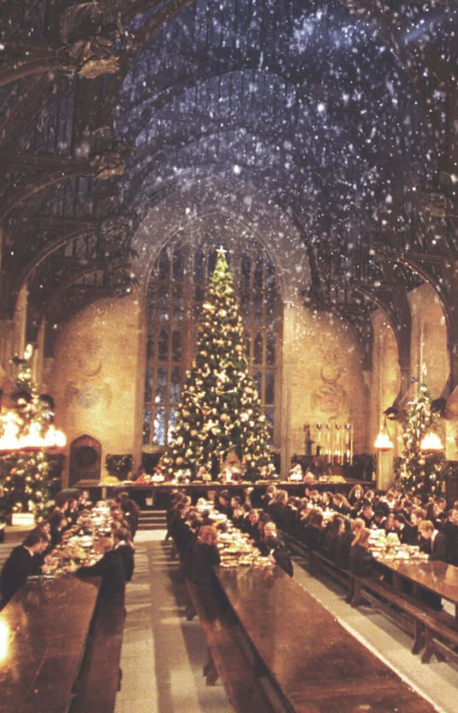 Festive Hogwarts Great Hall Christmas Wallpaper with Enchanted Ceiling